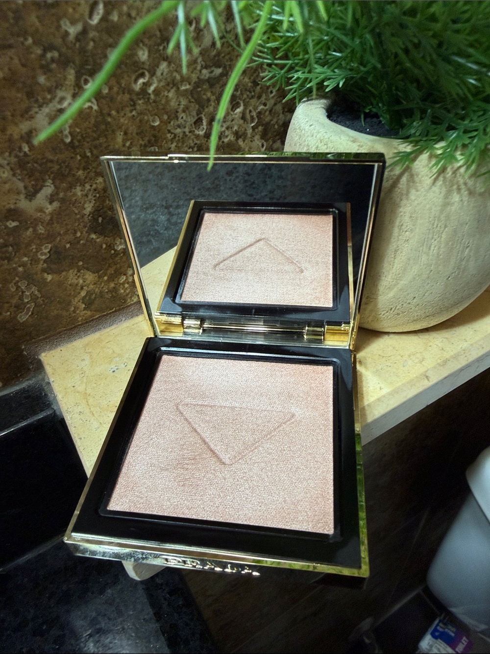 Prada Light Glowing Highlighter Powder 001 $90